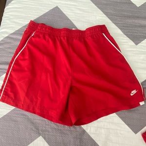 red nike shorts